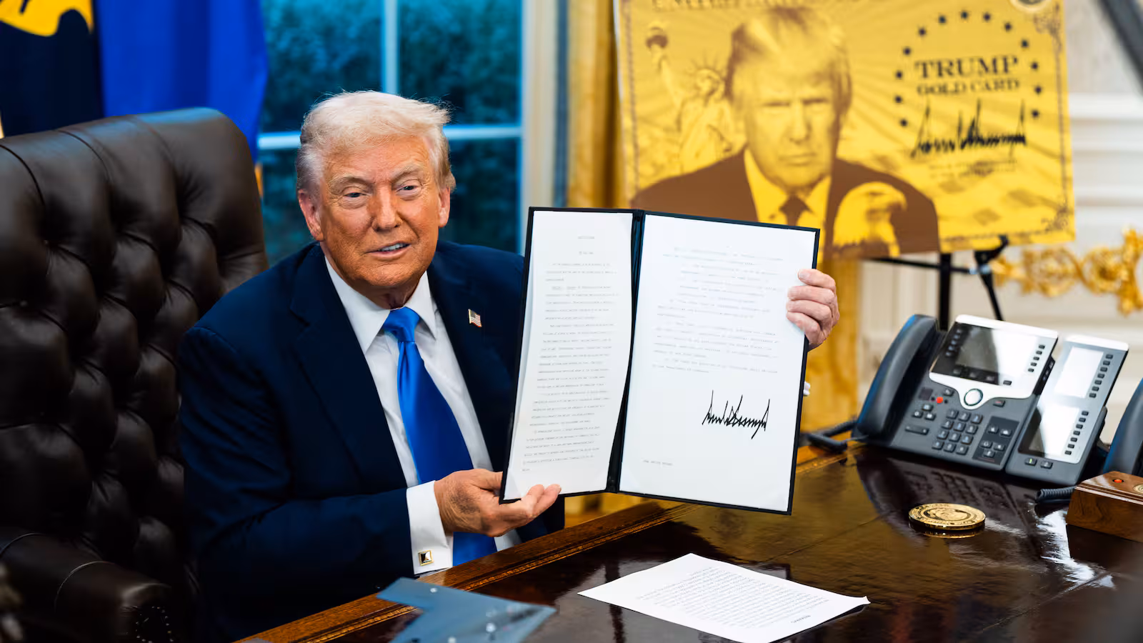 President Trump signing an Executive Order mandating for $100k fee on H1B seekers