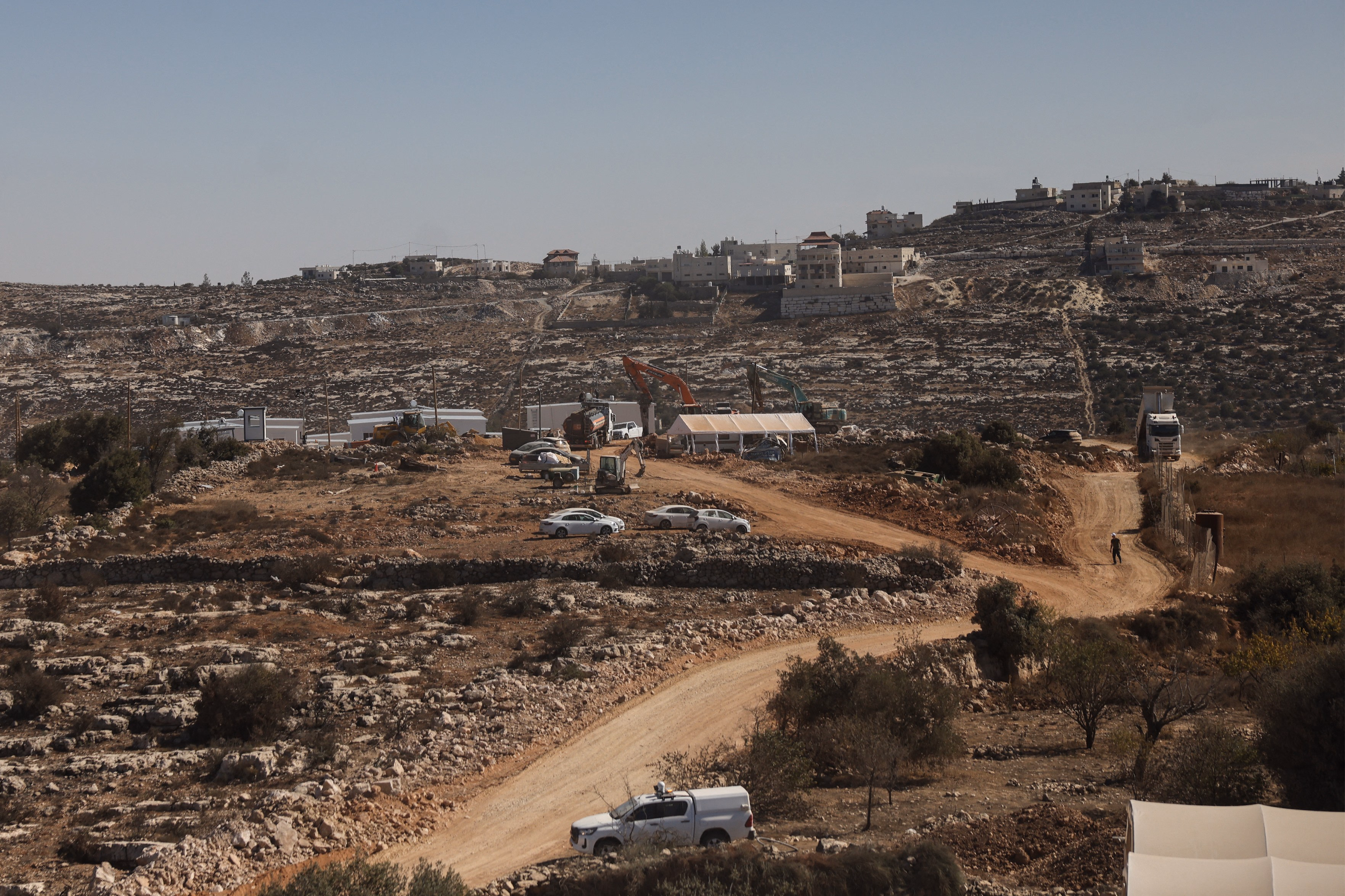 Israel approves 19 new settlements in occupied West Bank, bringing total to 210