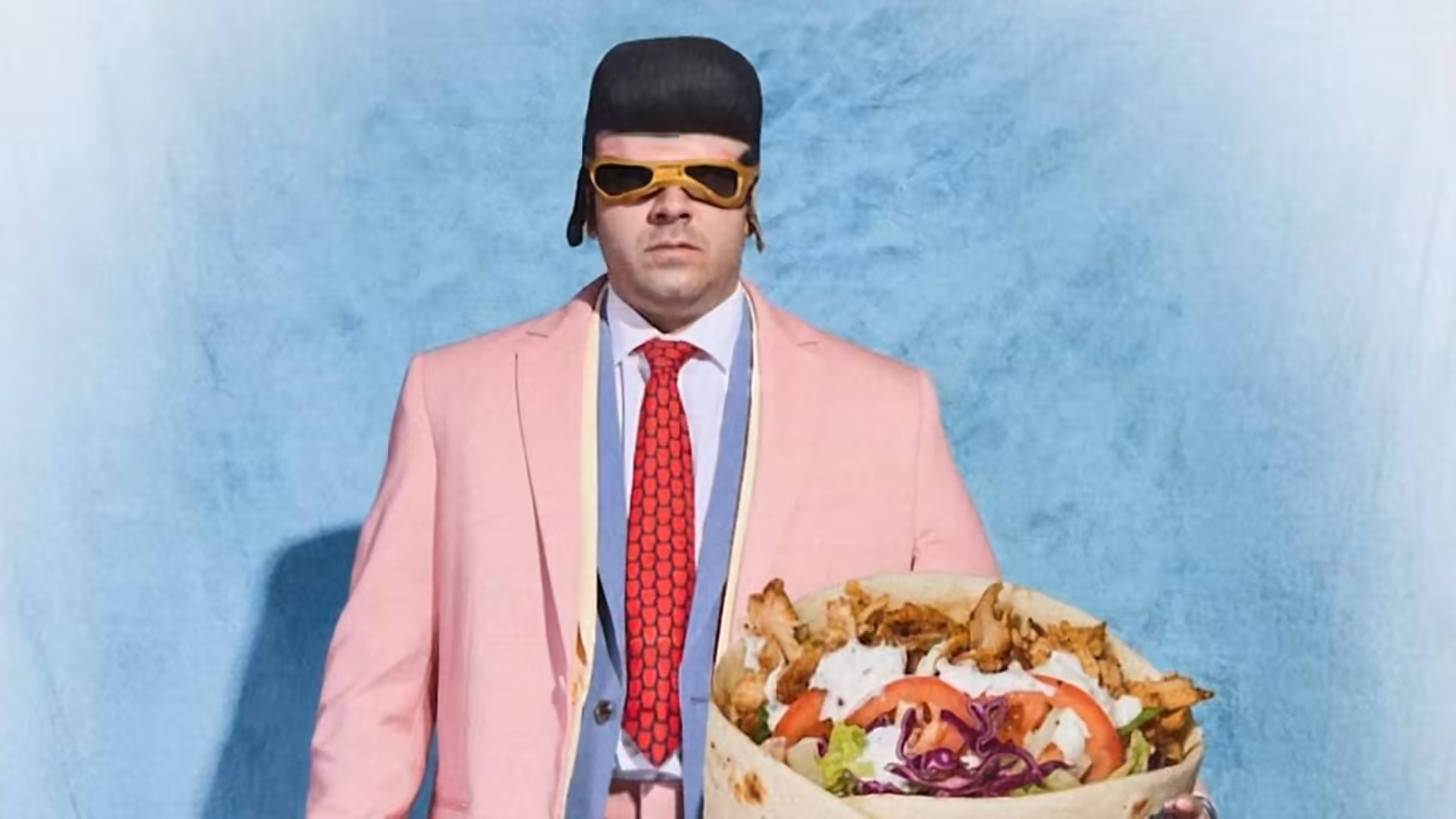 Fiorello hosts masked artist TonyPitony on Italian television, urges Sanremo organizers to book him