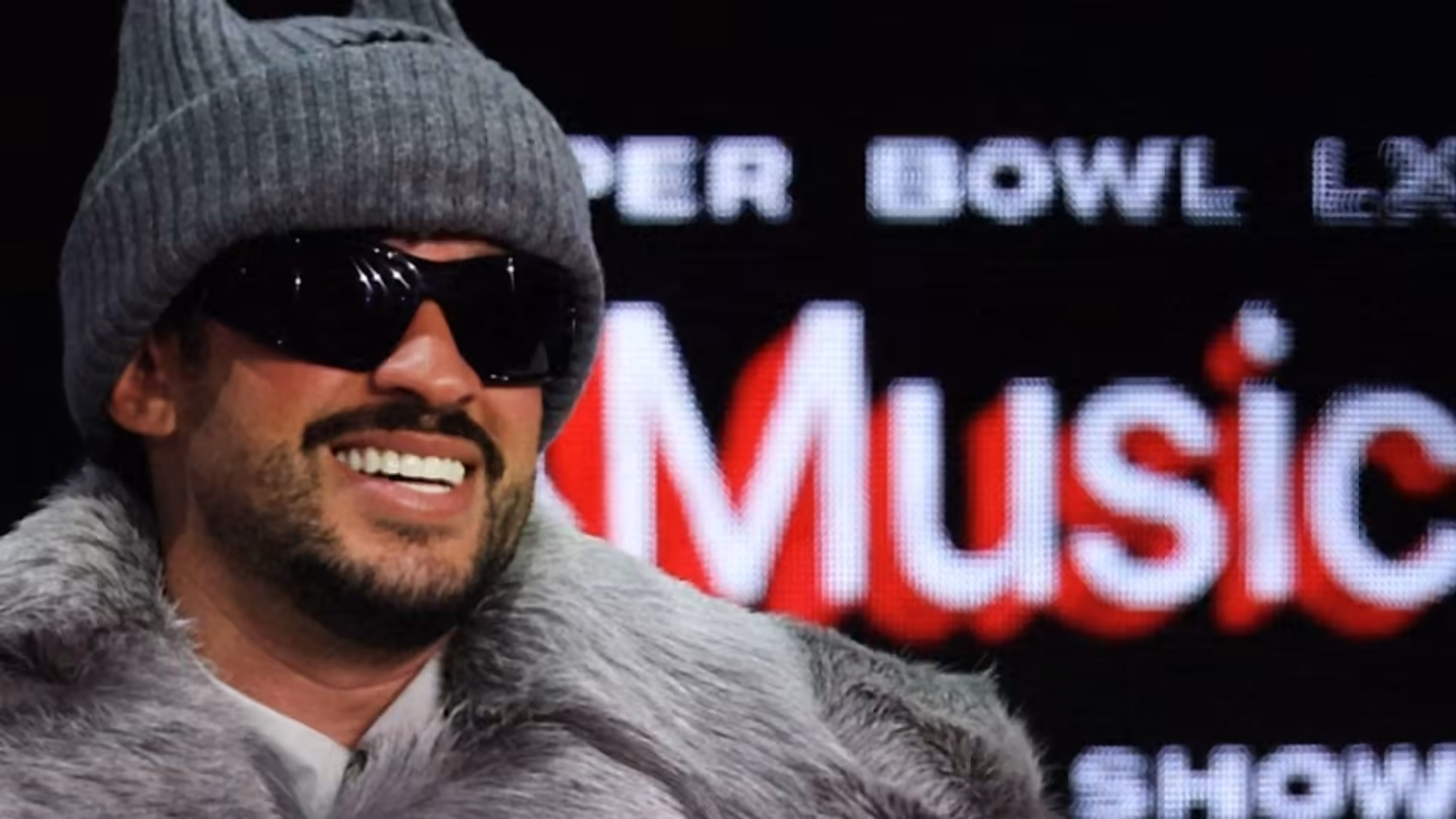 Bad Bunny walks back comment that fans should learn Spanish before Super Bowl performance