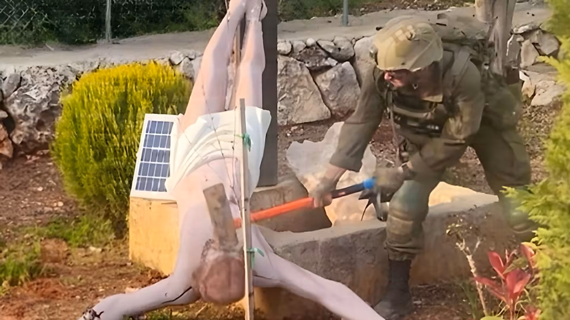 Israeli soldier investigated after photo shows him smashing Jesus statue in Lebanon
