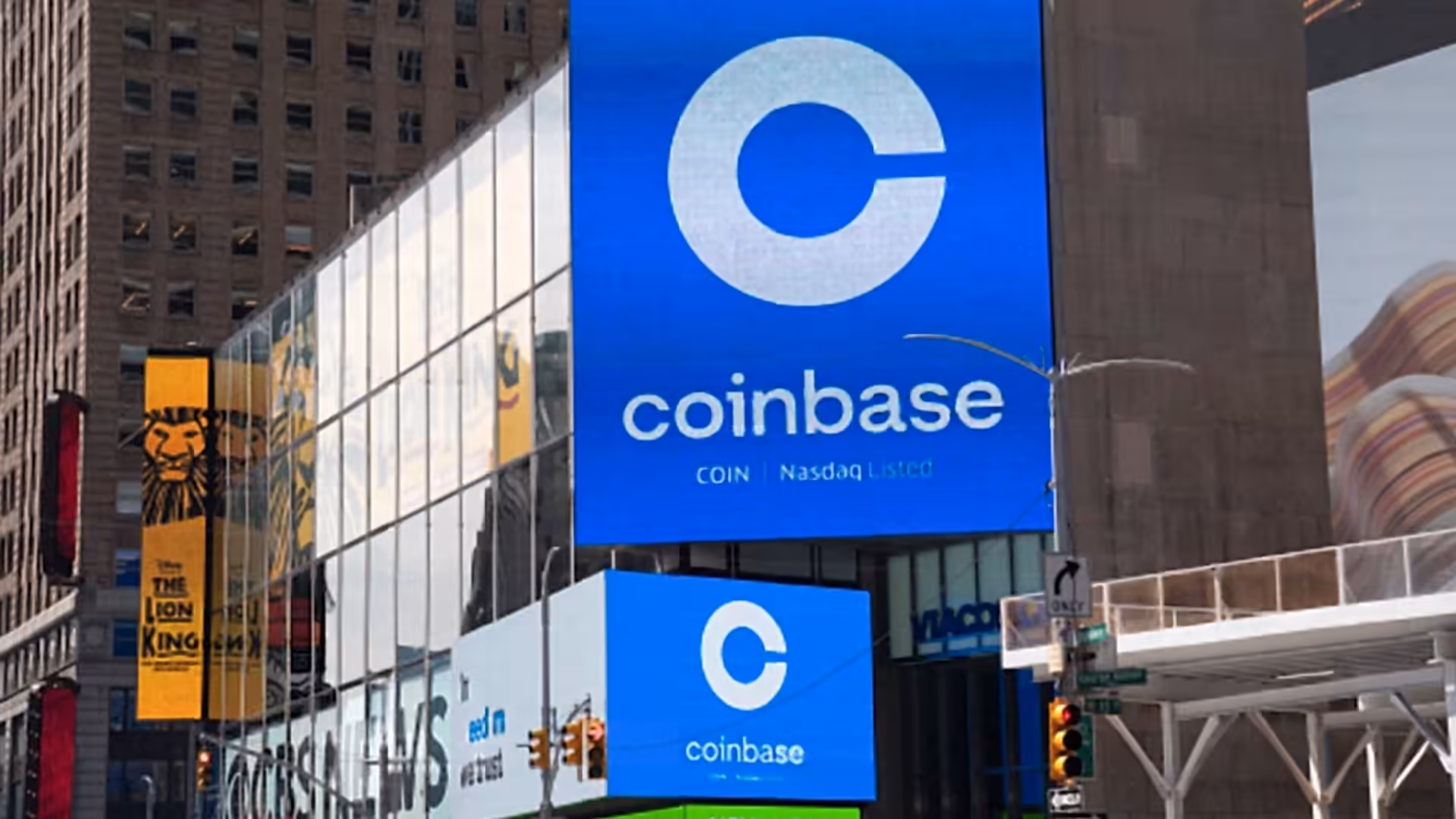Coinbase cuts 14% of workforce, citing AI acceleration