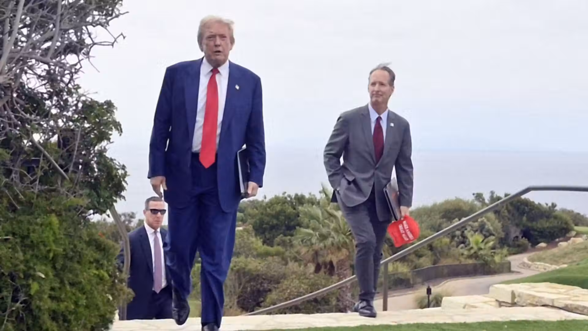 Armed man arrested at Trump golf course ahead of fundraiser