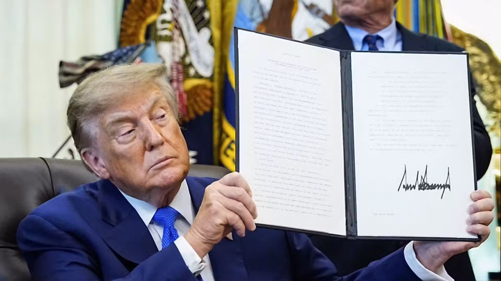Trump signs order cutting childhood vaccine recommendations to 11