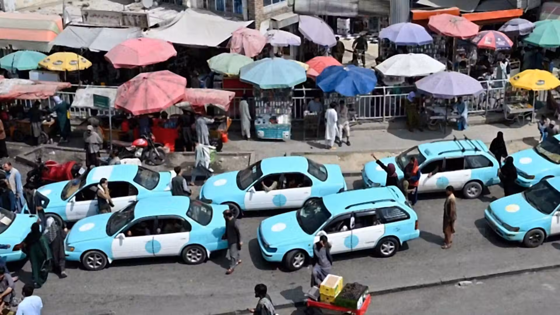 Afghan taxi drivers play music despite Taliban ban