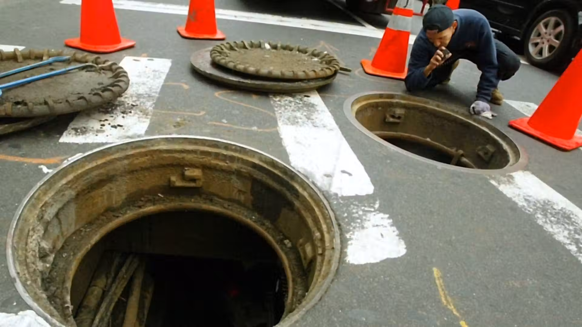 Two Queens men arrested after emerging from Midtown manhole