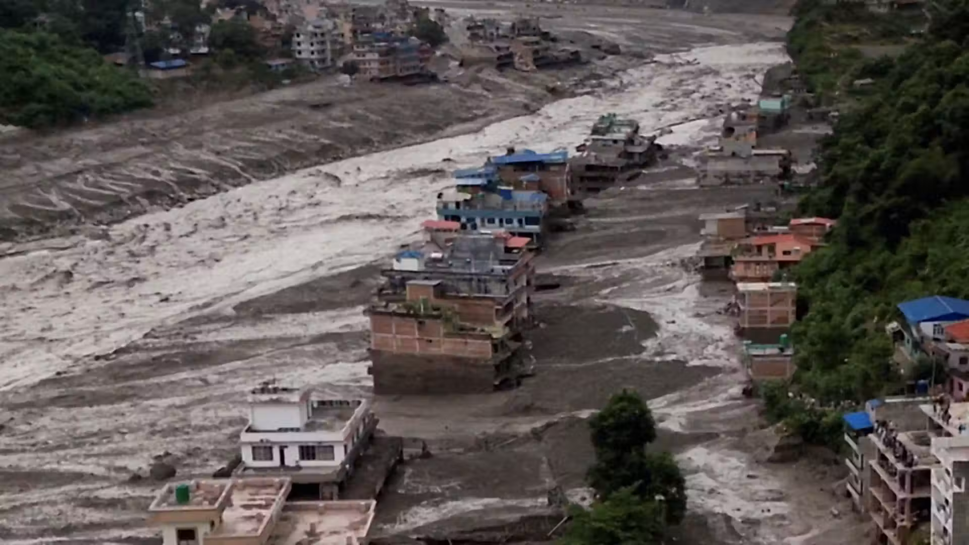 Flash flood sweeps away 40 houses and six bridges in Nepal