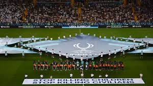 Humanitarian banners displayed prior to a UEFA game.